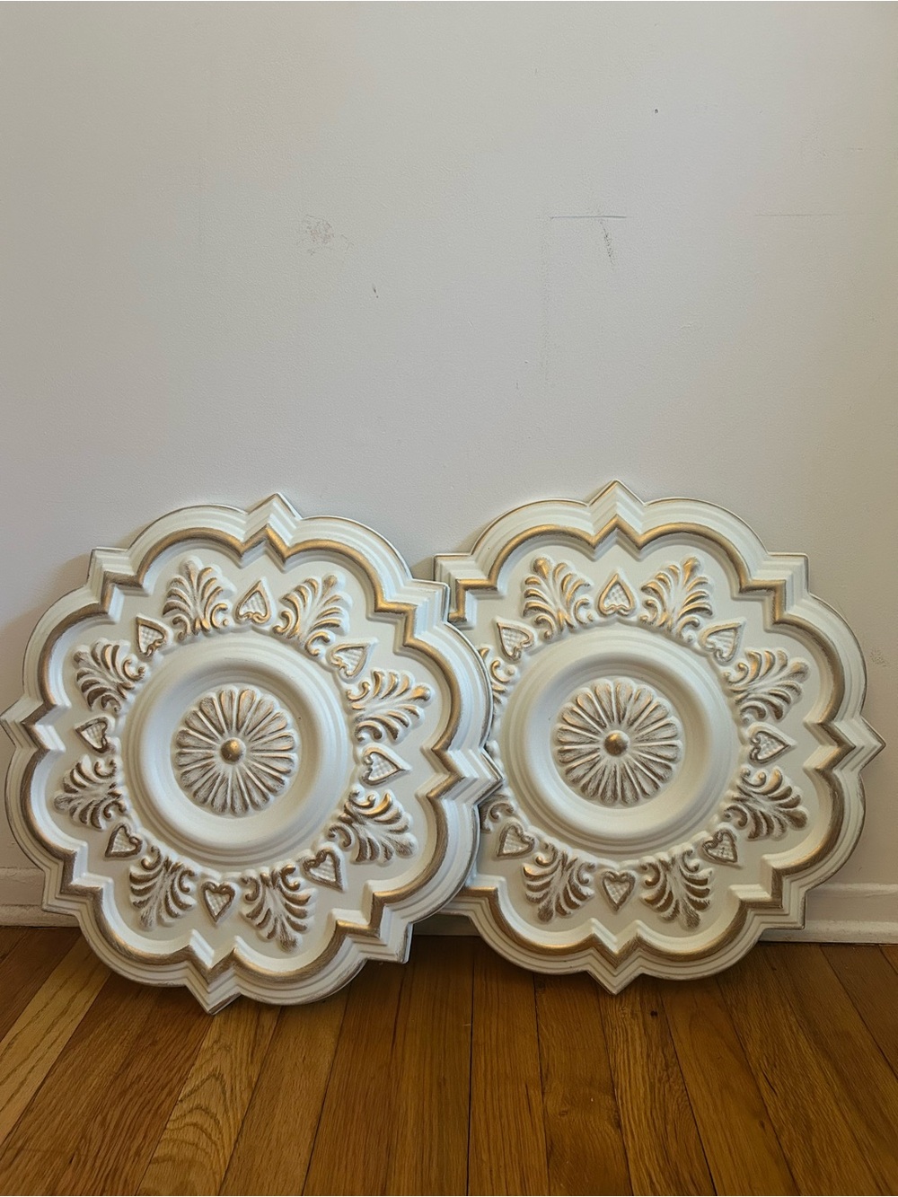 Pair of Ornamental Wall Medallions in Cream with Gold Accents